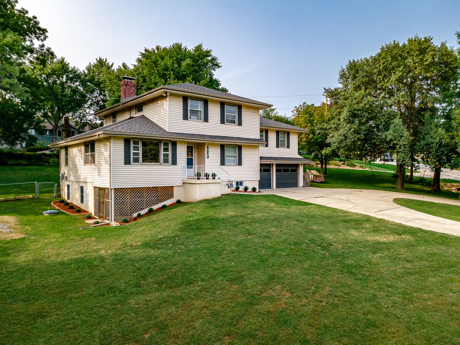 7720 NW EASTSIDE Drive by KC Home Photography