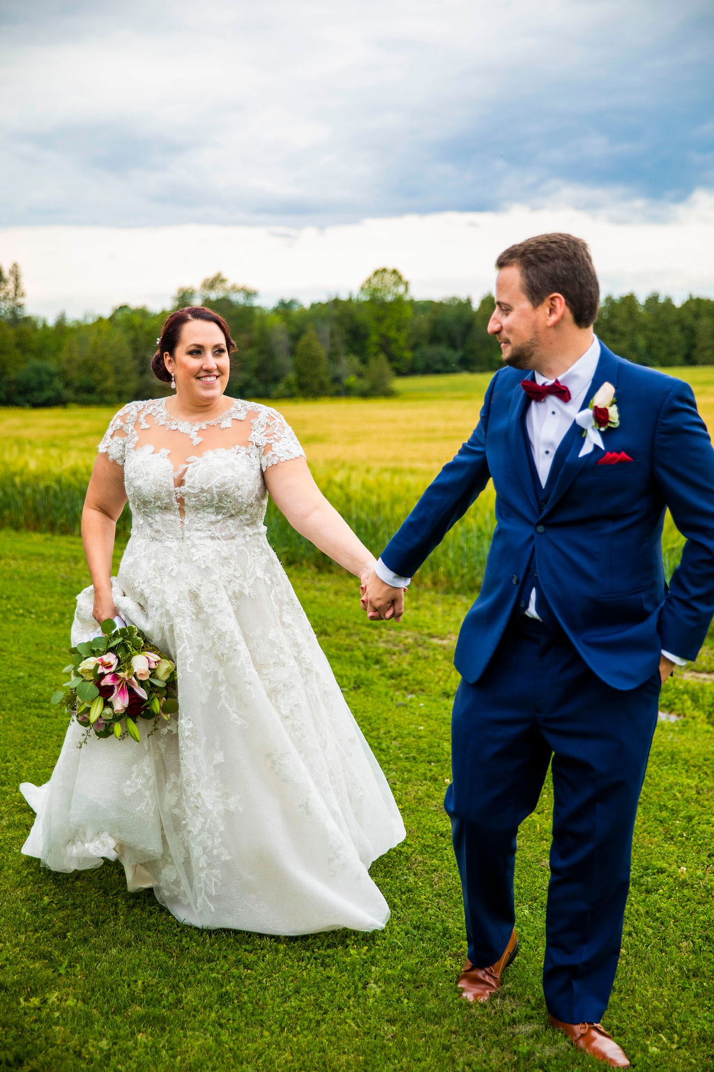 Kelsey and Dan walking hand in hand