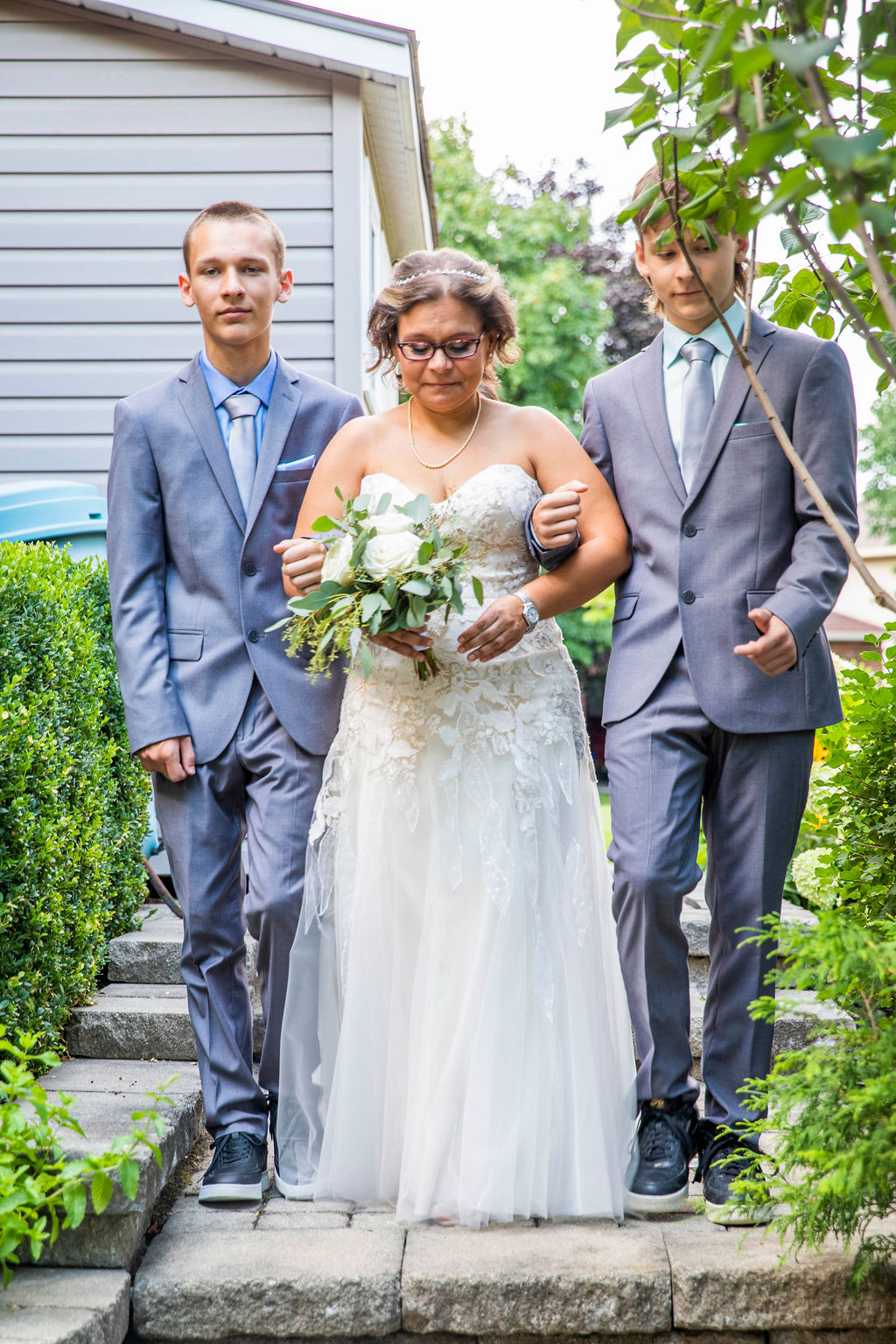 Christine walking down the garden path