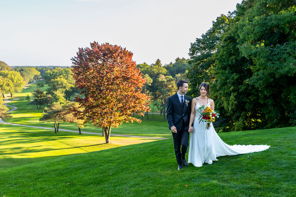 Brandon and Katherine, golden light on the grounds