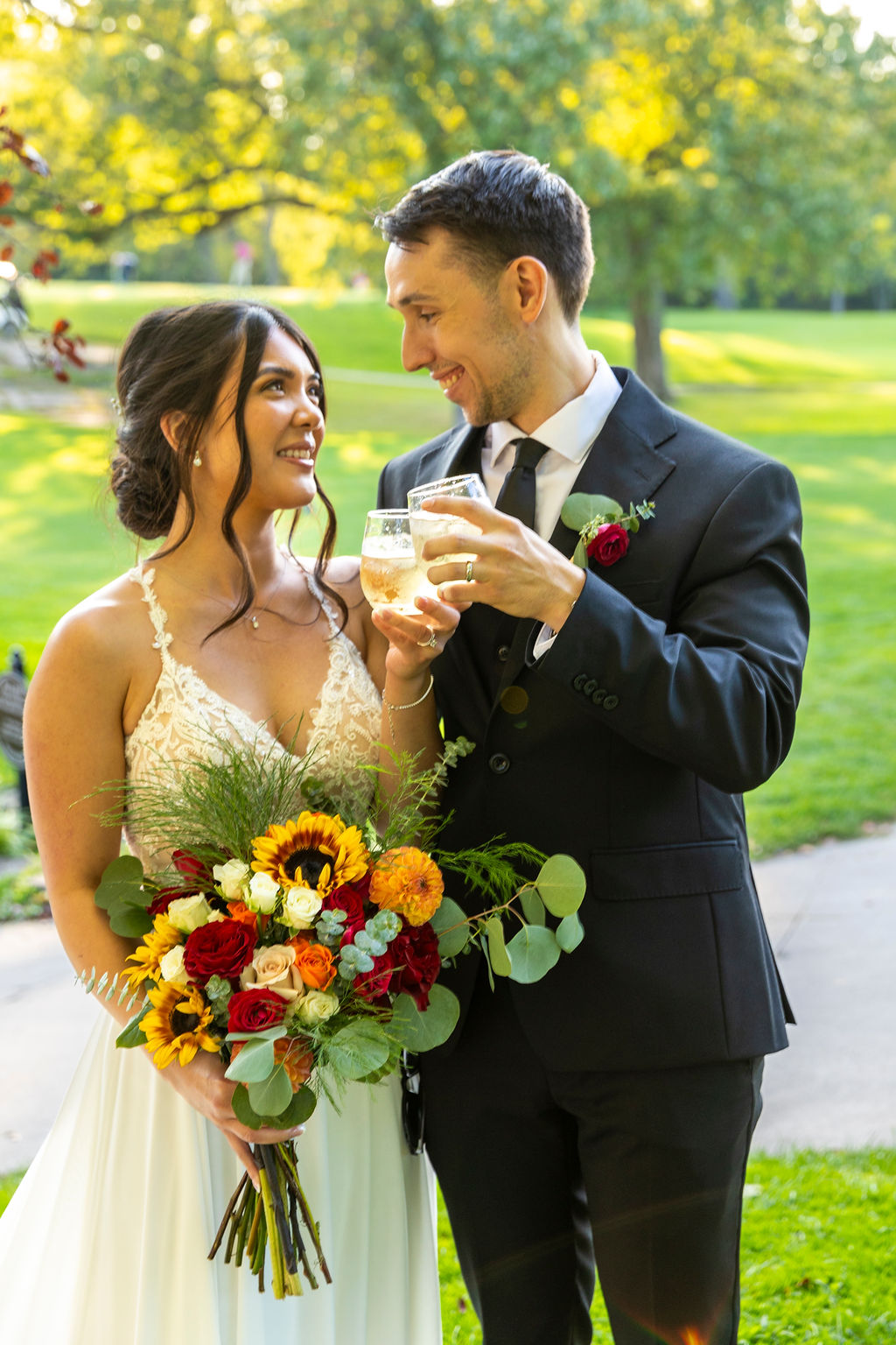 Brandon and Katherine raising a glass