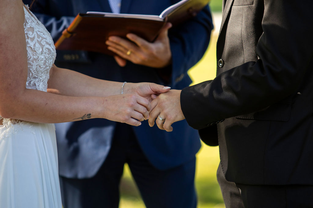 Brandon and Katherine exchanging rings