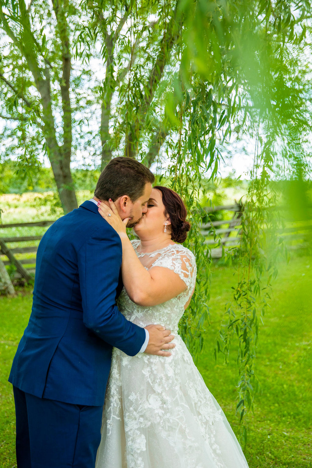 Kelsey and Dan under a willow