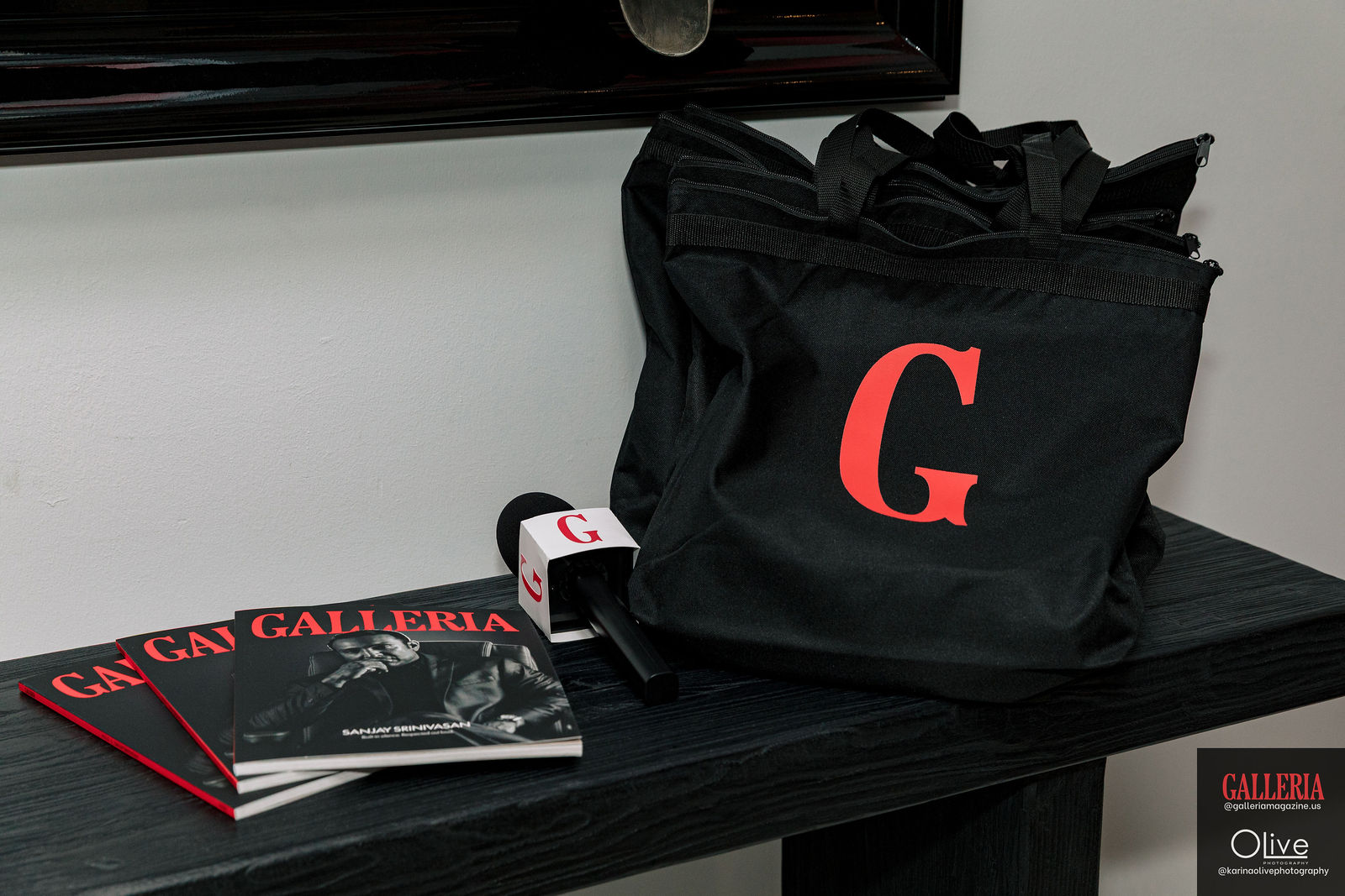 Copies of the first issue stacked beside a GALLERIA tote bag.