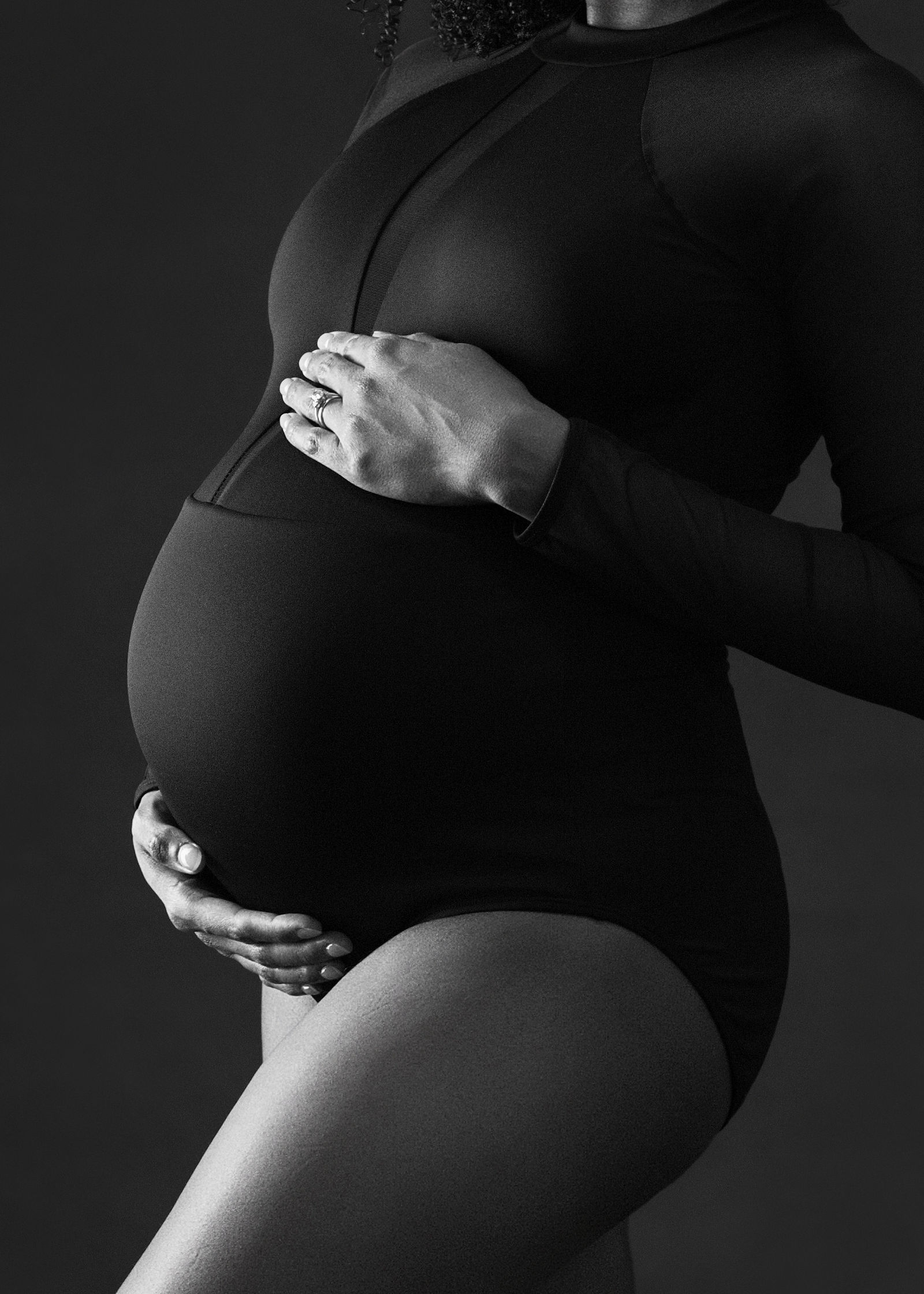 Utah studio maternity photographer using soft window light for pregnancy portraits