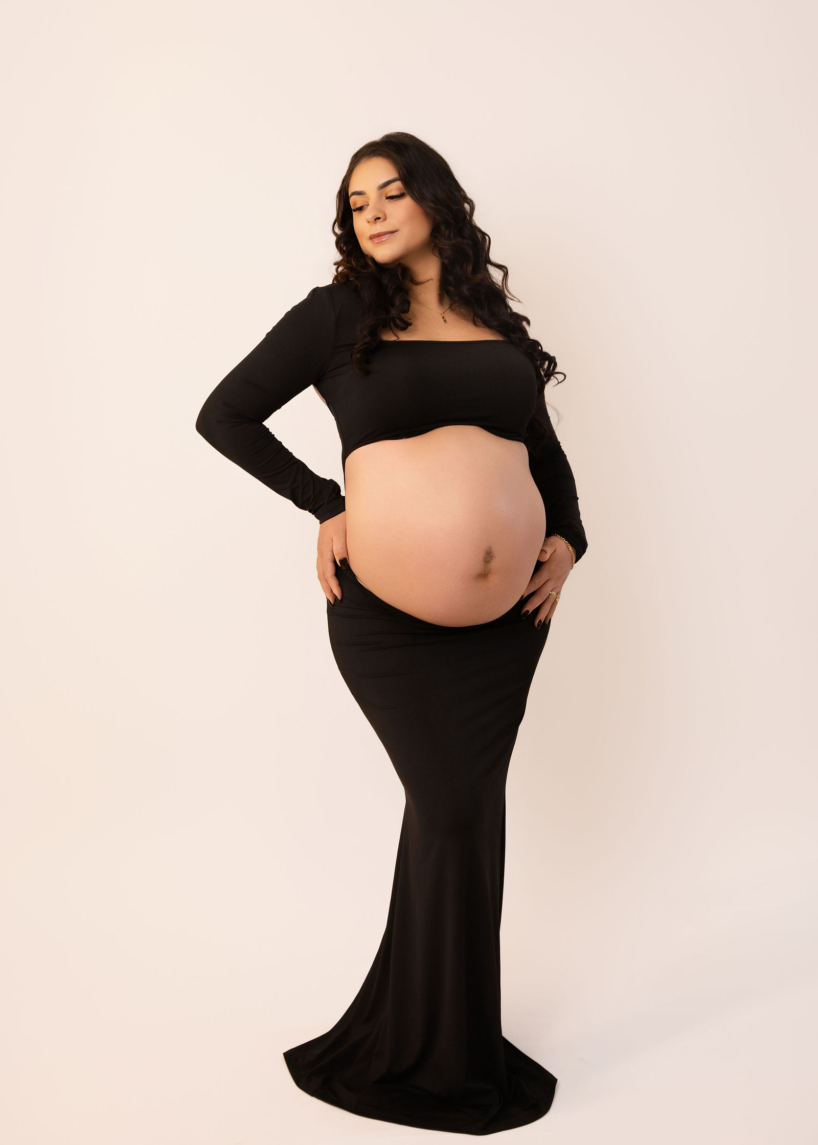Utah maternity photographer studio session with elegant fitted dress
