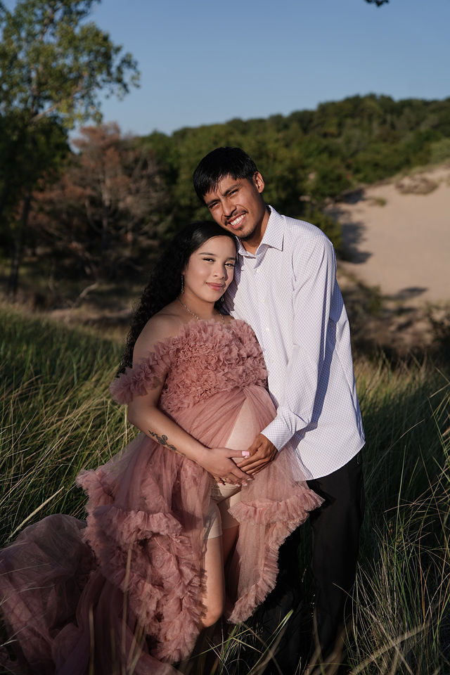 Emily — intimate maternity moment with warm tones
