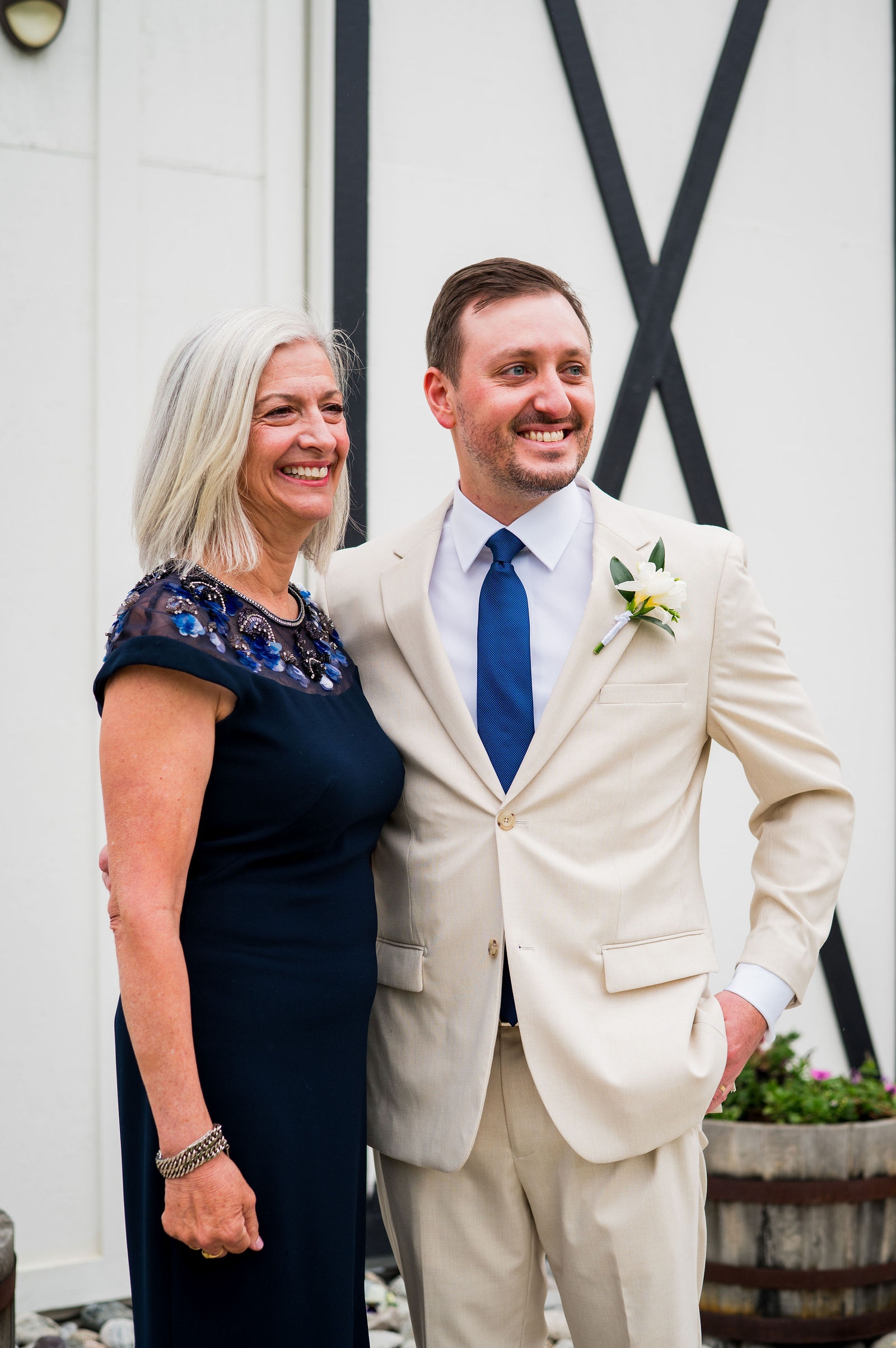 Groom and his mother during their first look in Morrison Colorado