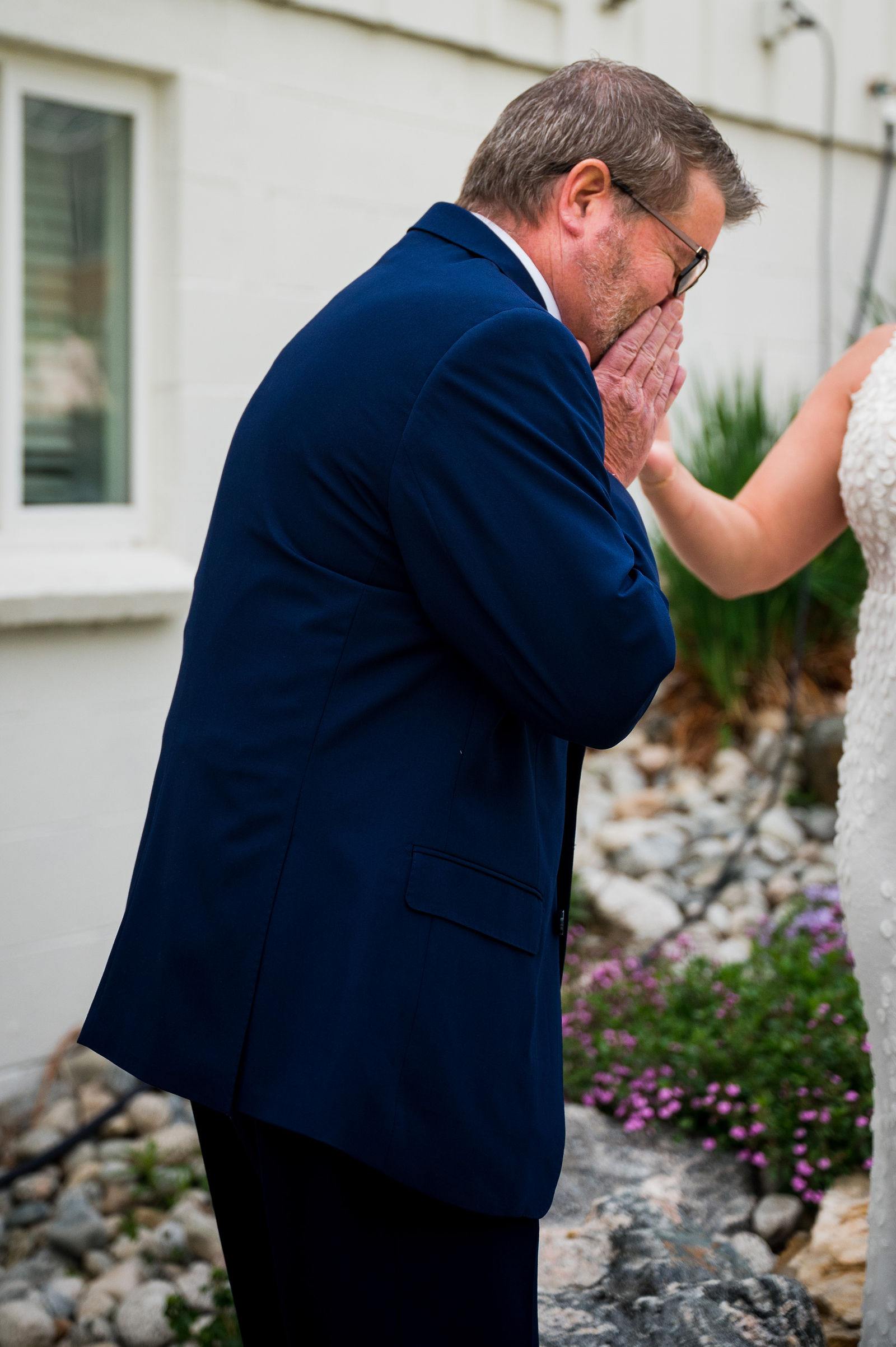 Father of the bride overcome during his first look at a Colorado wedding