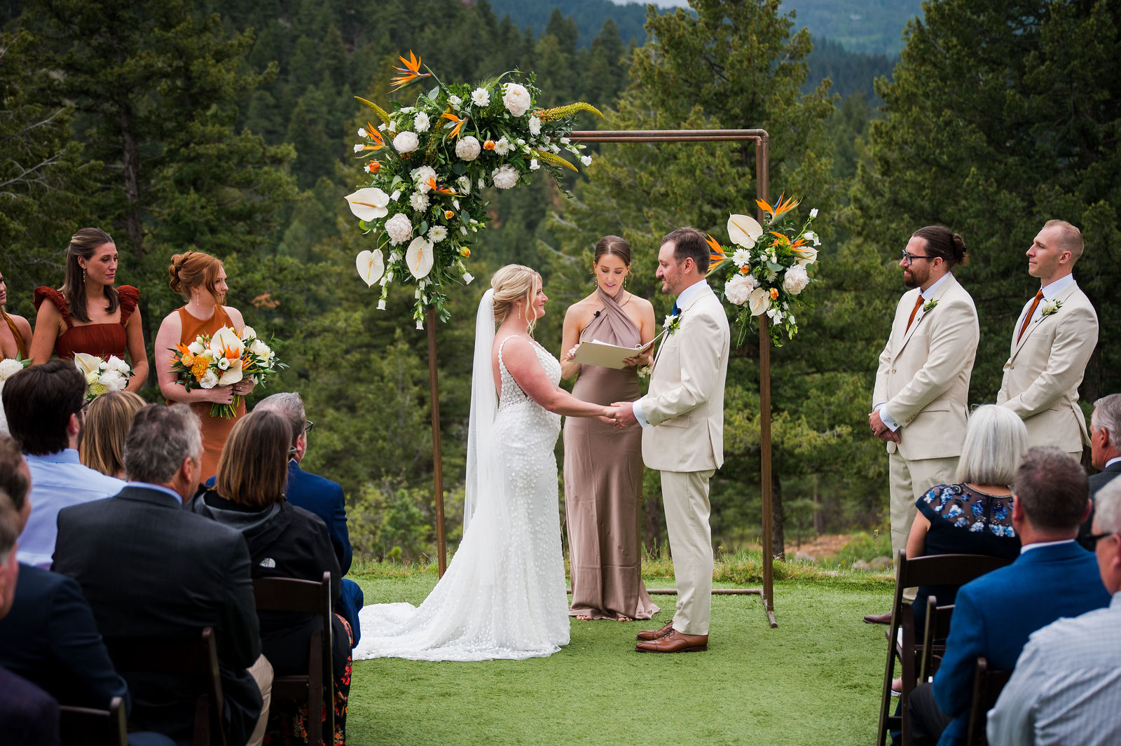 Mountain view wedding ceremony at The Woodlands in Morrison Colorado