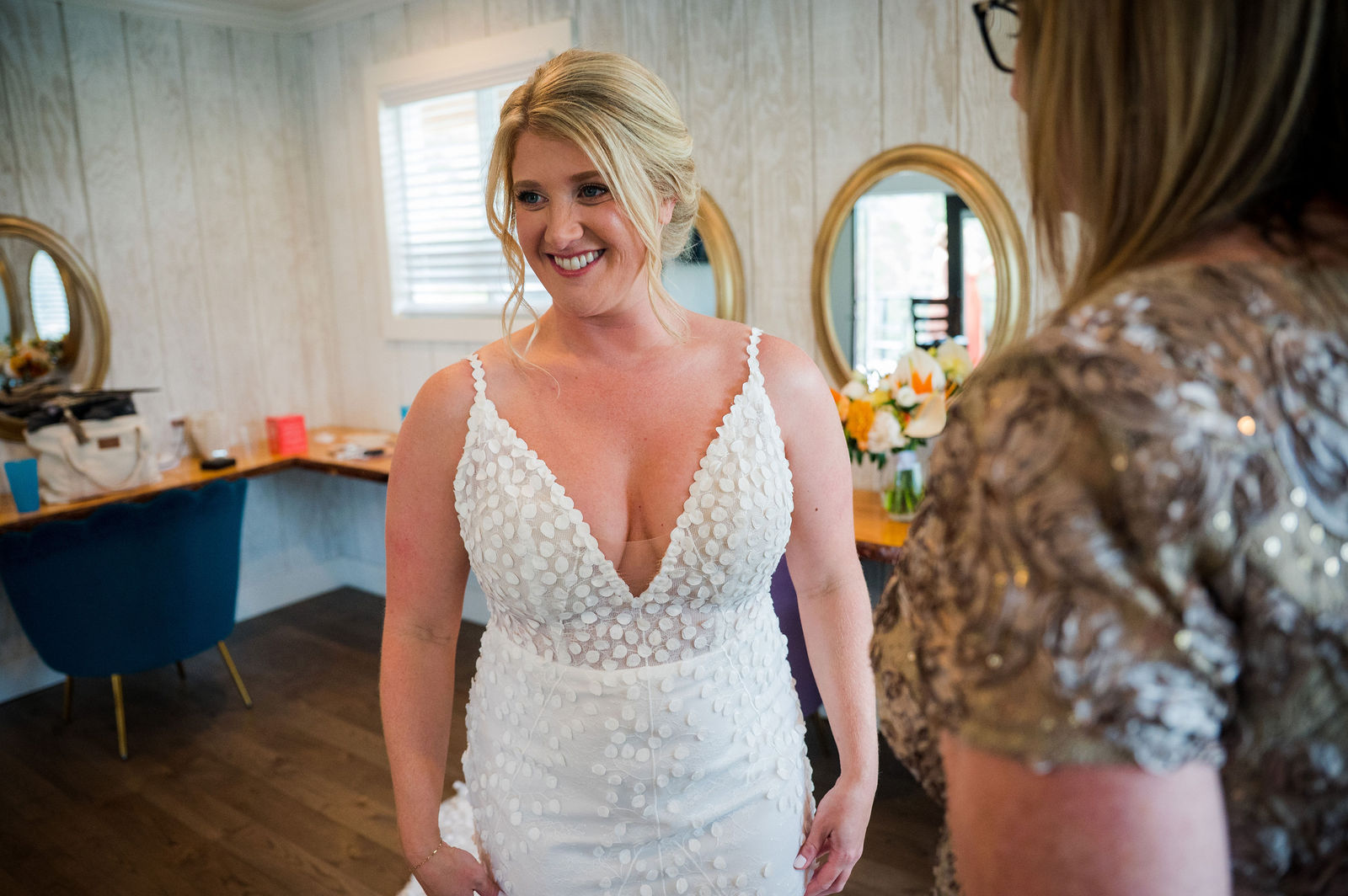 Bride seeing herself in her wedding dress for the first time in Golden Colorado