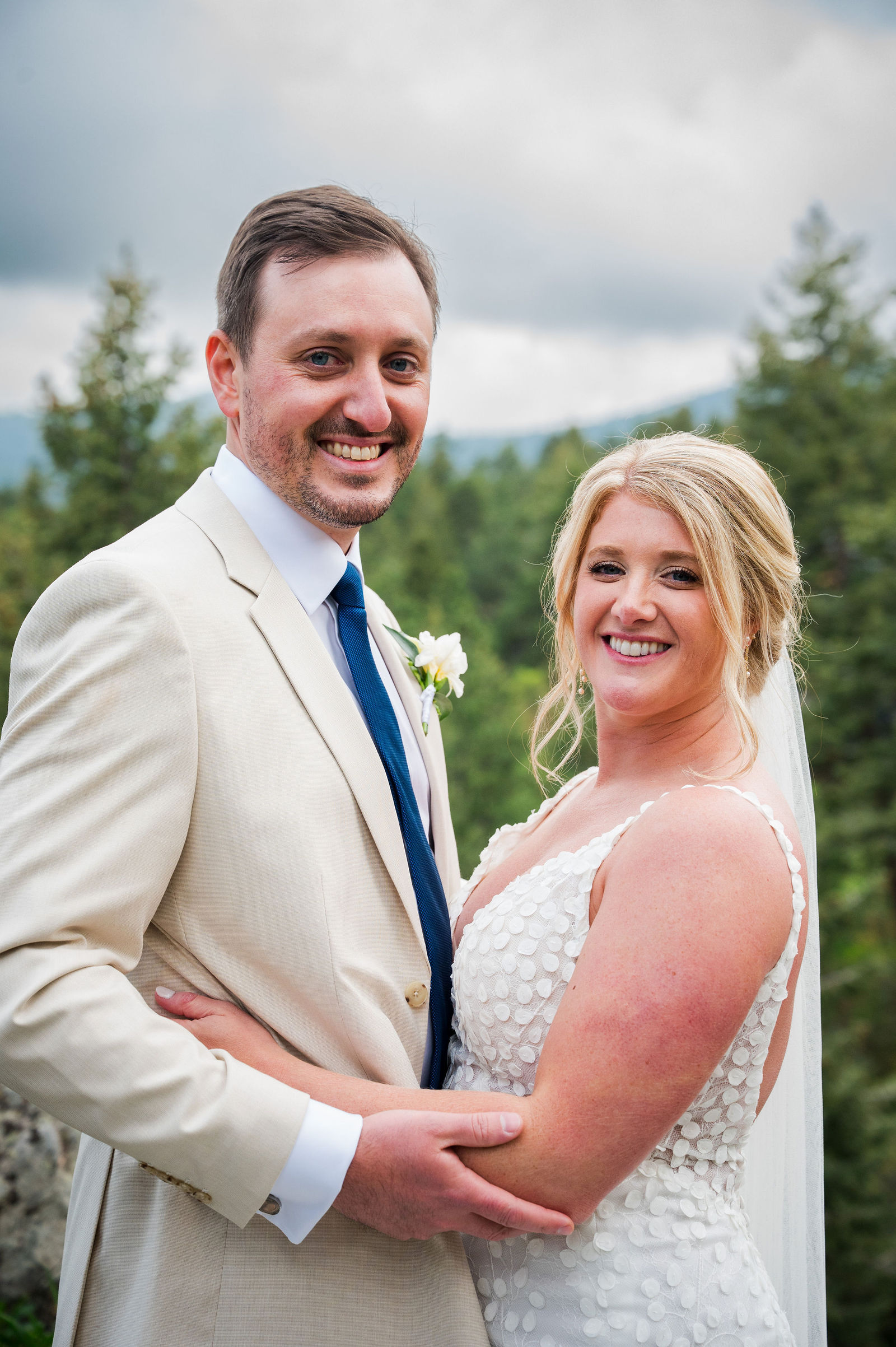 Bride and groom portrait in the pines at The Woodlands in Morrison Colorado