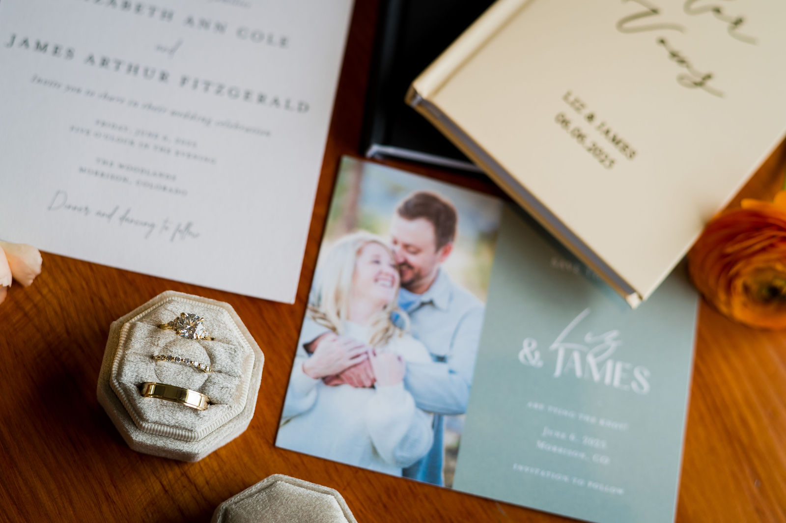 Wedding invitation suite with rings at The Woodlands in Morrison Colorado