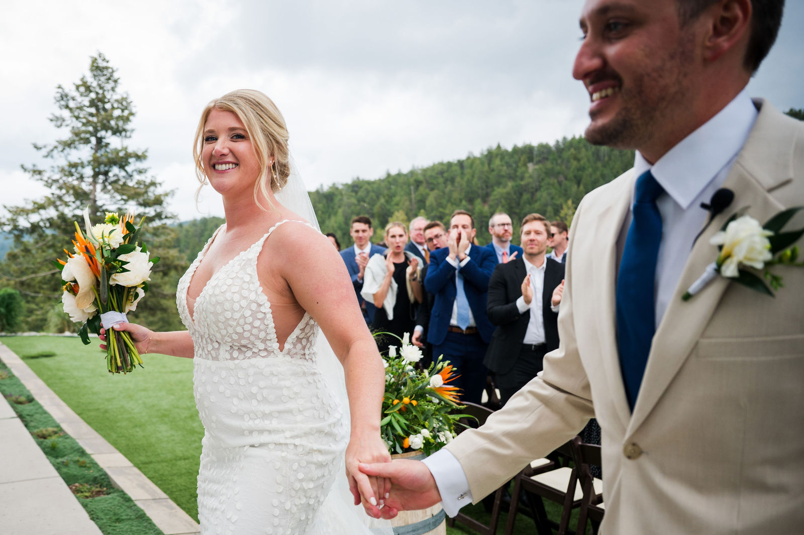 Just married couple smiling after their ceremony at The Woodlands Colorado