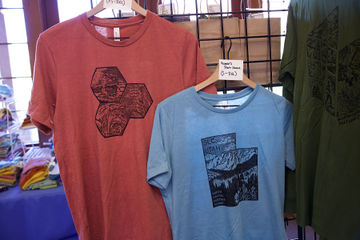 Event shirts displayed at the North Capitol Summit 2026