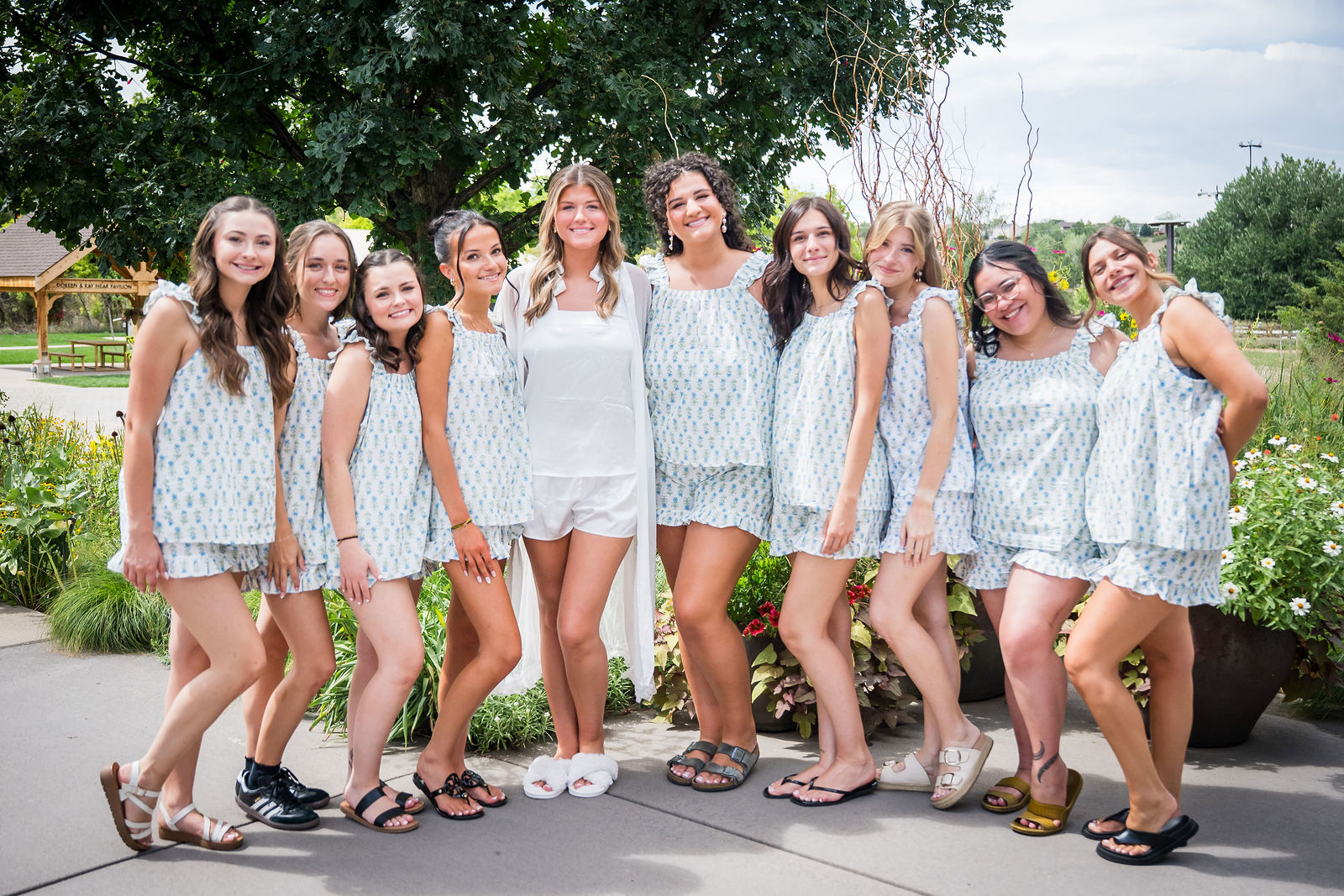 Bridesmaids in matching pajamas before a wedding at Chatfield Farms