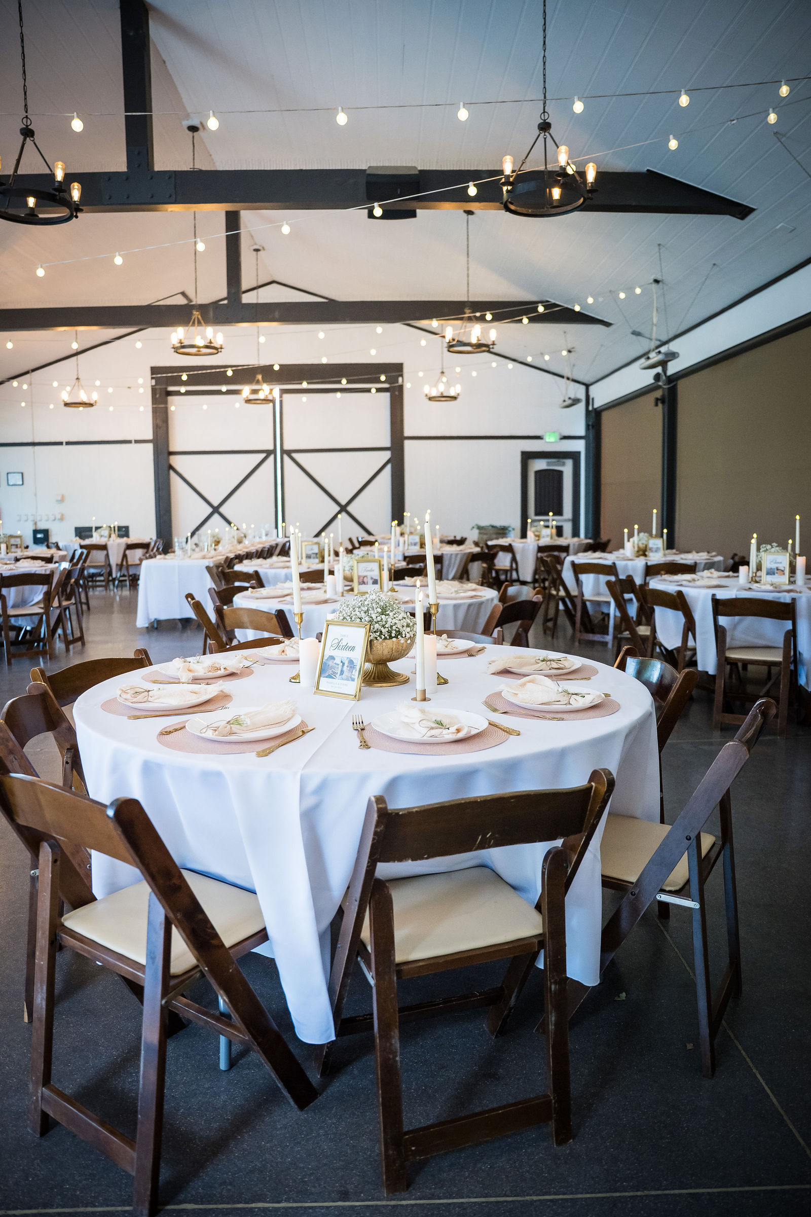Place setting at a barn wedding reception in Colorado