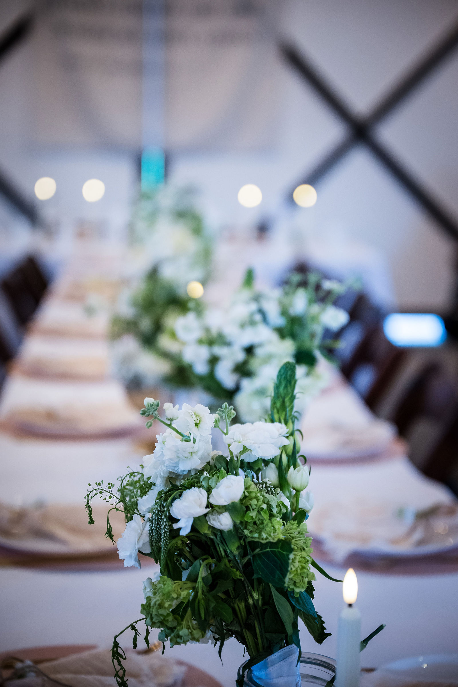 Wedding cake with greenery at Chatfield Farms