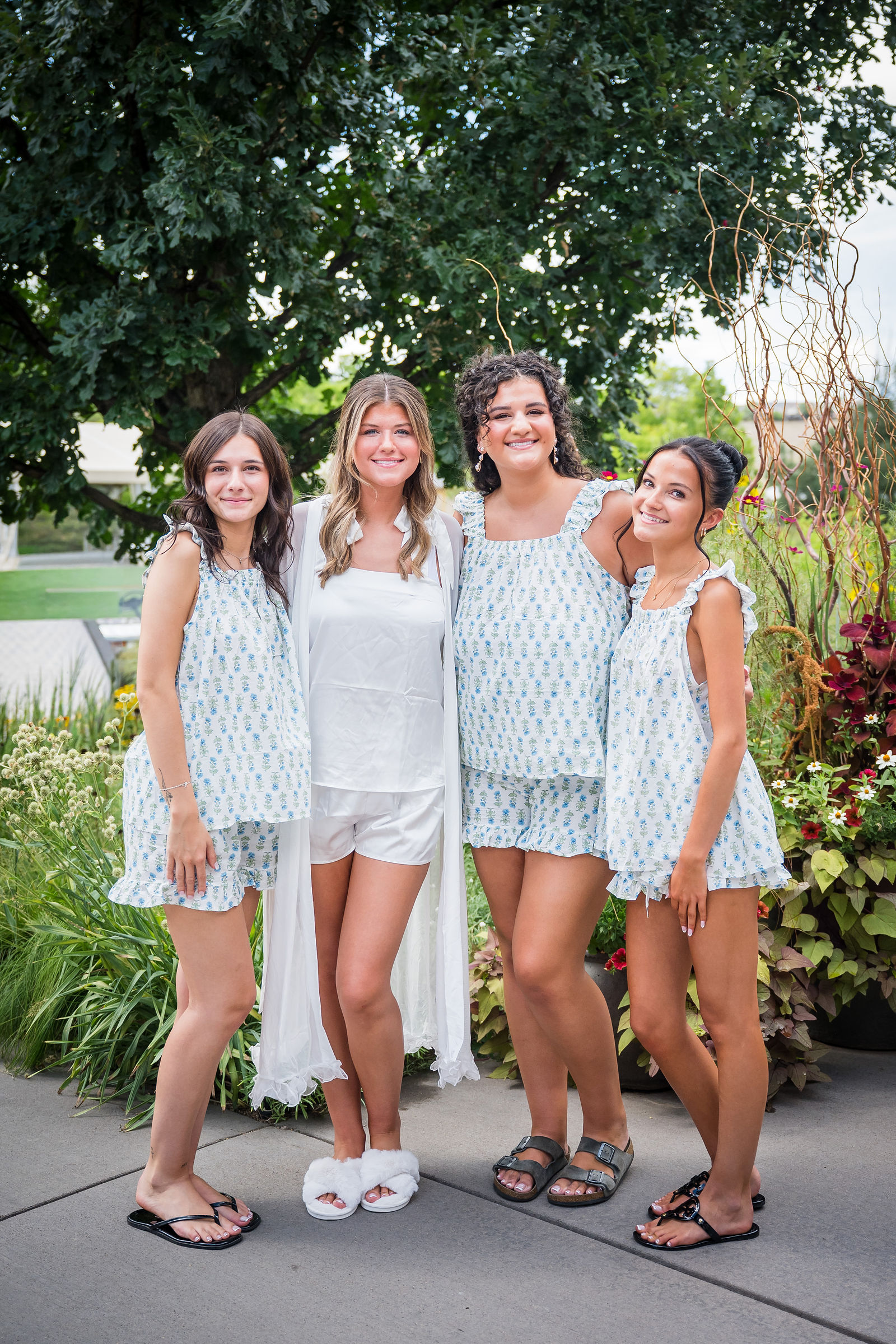 Bridesmaids laughing together on the wedding morning