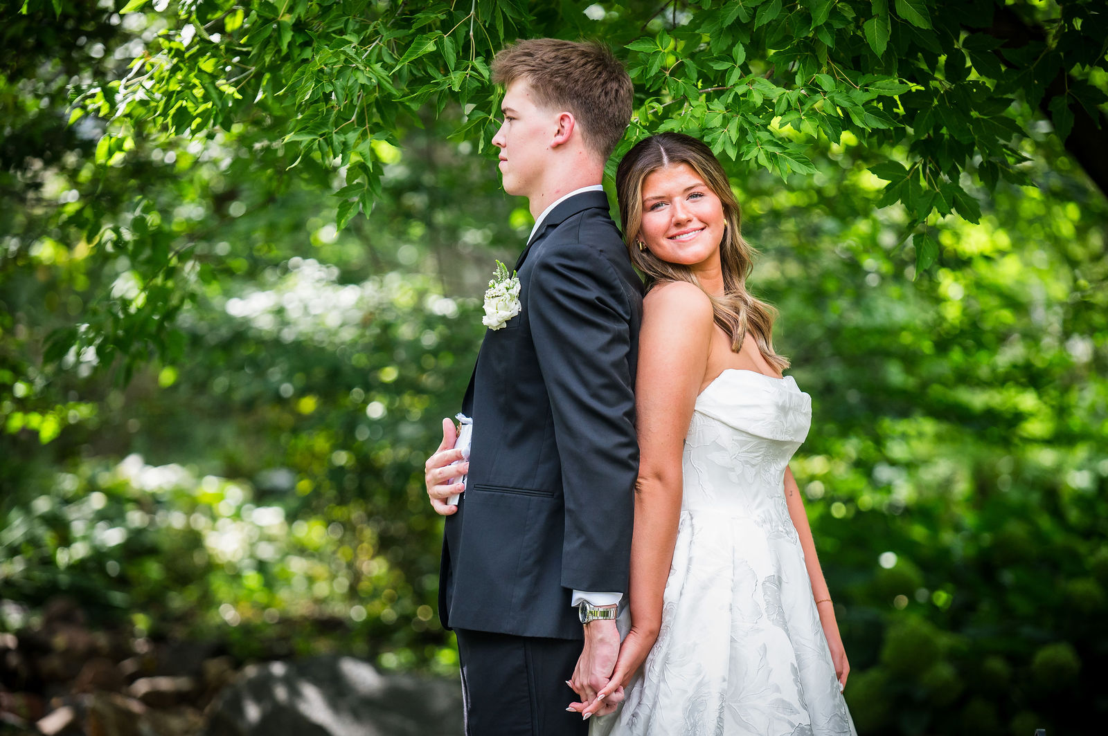 Bride and groom embracing after reading their private vows