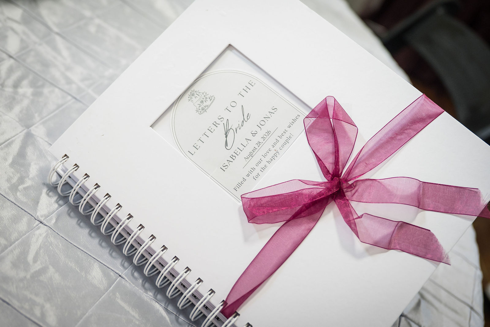 Wedding guest book tied with ribbon