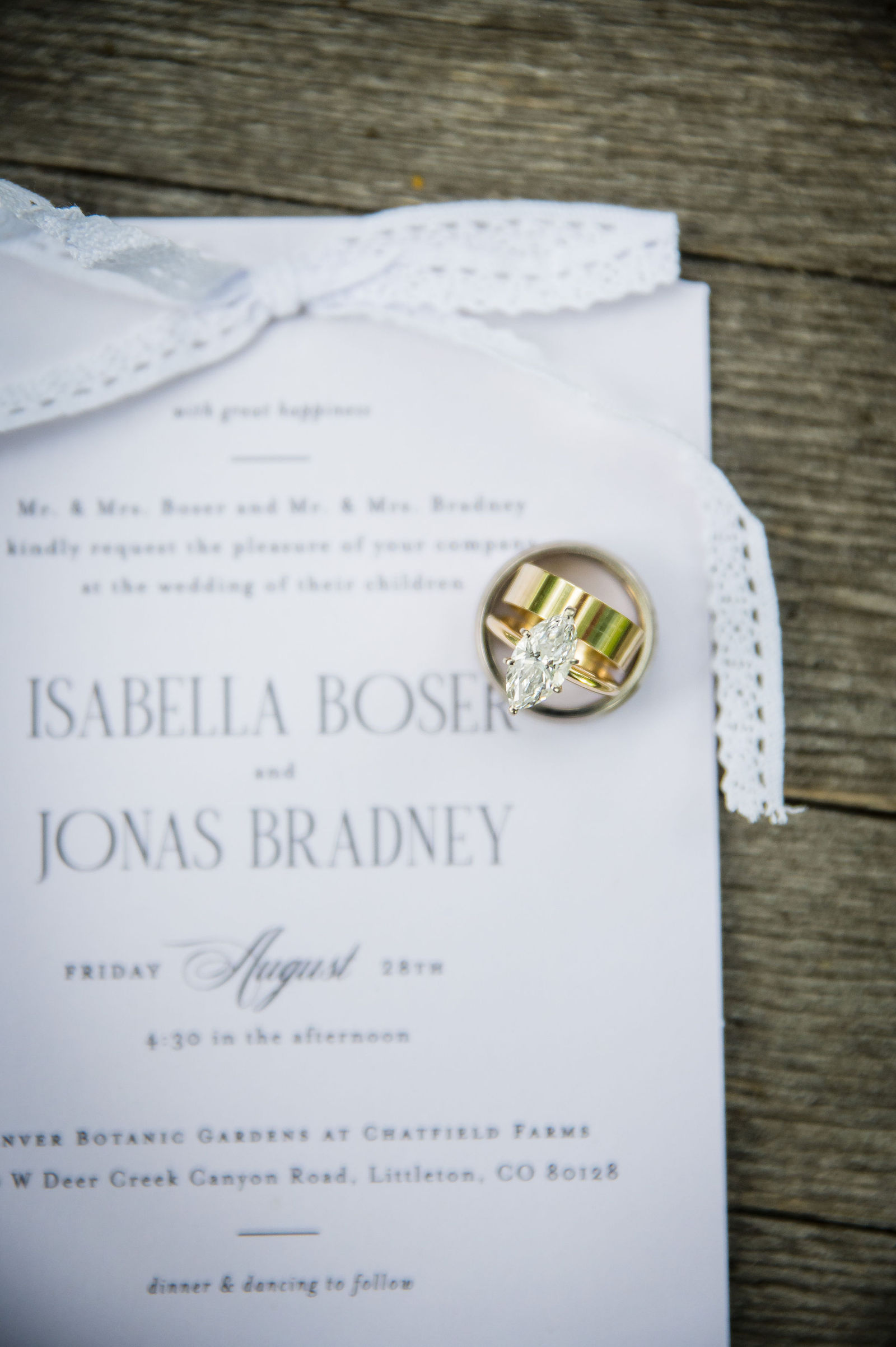 Wedding invitation suite with rings at Chatfield Farms