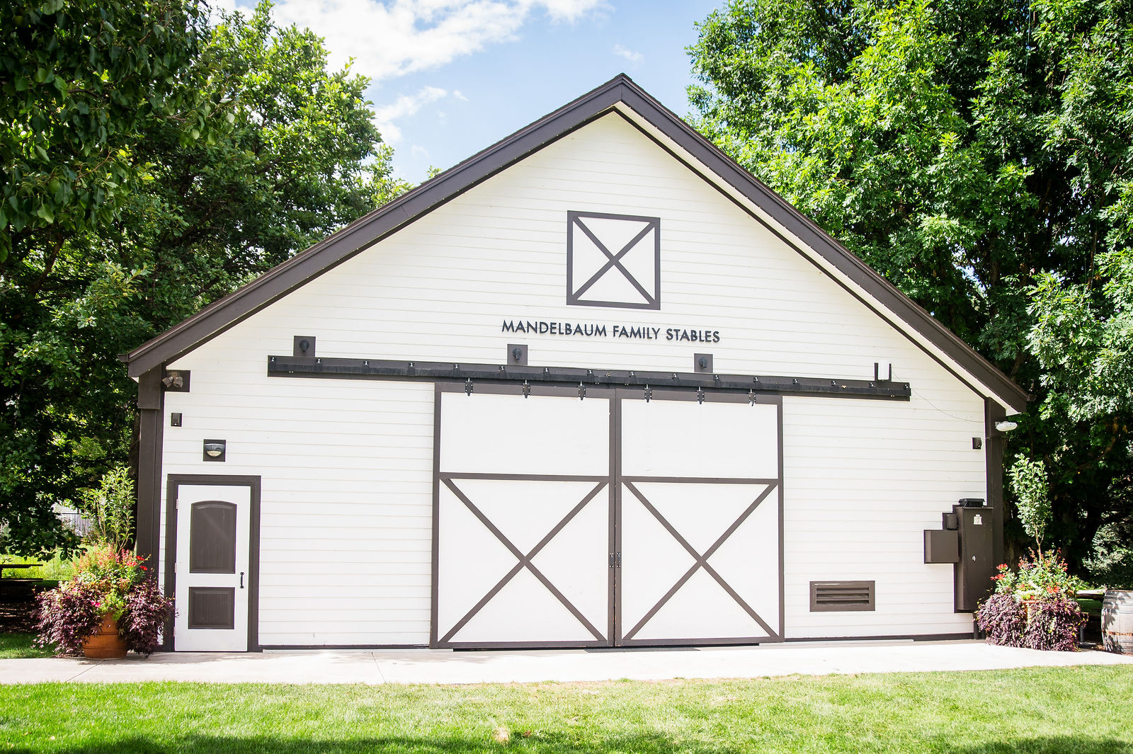 White school house at Denver Botanic Gardens Chatfield Farms on a wedding morning
