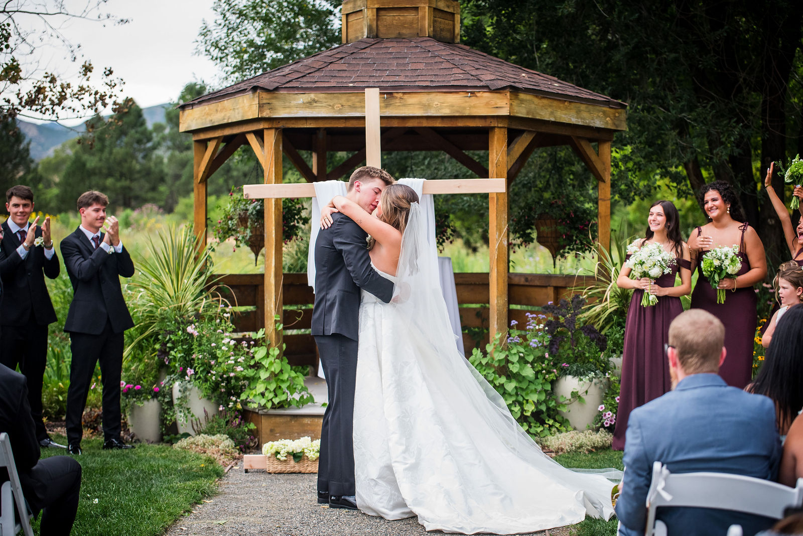 First kiss under the gazebo at Denver Botanic Gardens Chatfield Farms